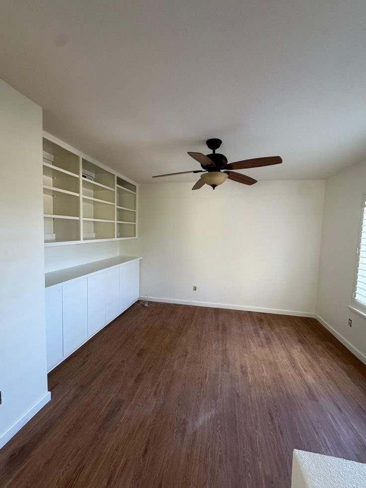 Freshly painted bedroom with built-ins